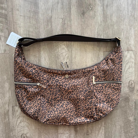 lululemon athletica Handbags - Lululemon Large Slouchy Sling Bag 13L Leopard Print Metal Hardware LU9DEYS NWT